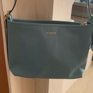 Coach teal leather adjustable crossbody bag. Gently used.